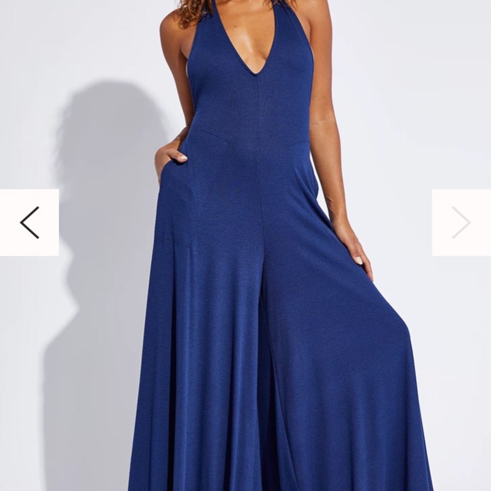 Teal free people jumpsuit, size M